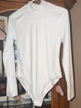 NEW NWT MEDIUM White Long-Sleeve One-Piece Bodysuit. MUST BE BUNDLED